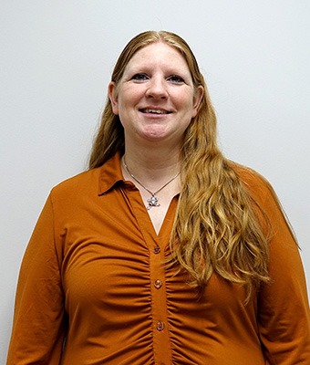 Title Clerk Jen David in Office at Eide Chrysler St. Cloud